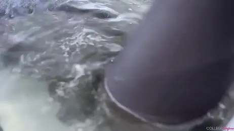 For water and stocking fetishists: she gets in the bathtub wearing her college uniform
