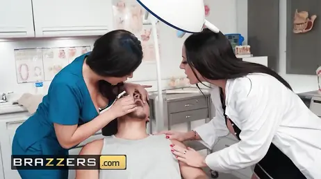 The dentist and the anesthesiologist fight over who gets to suck his big cock: what sluts!