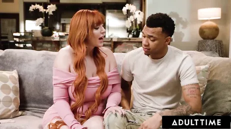 The busty redhead Lauren Phillips having sex with a young black man